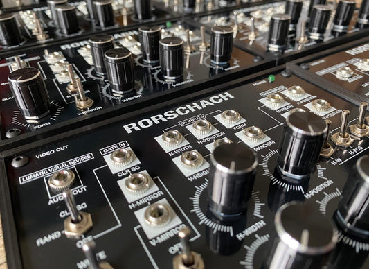 Many Rorschach video synths by Lumatic Visual Devices