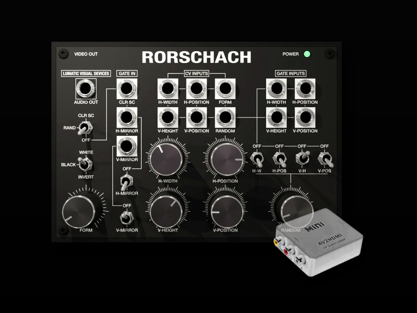 A Rorschach modular synthesizer control panel shown against a black background, with a small white HMI controller placed in front. The main product is the Rorschach panel, with visible controls, knobs, and labels including VIDEO OUT, POWER, and various audio/visual inputs.
